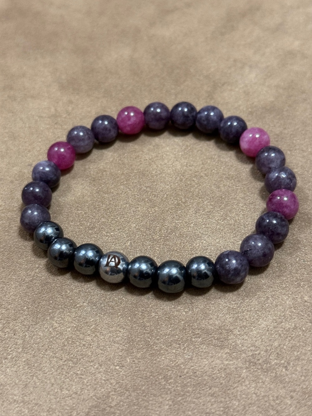 8mm Hematite and Purple-Pink Beaded Stretch Bracelet with Logo Accent